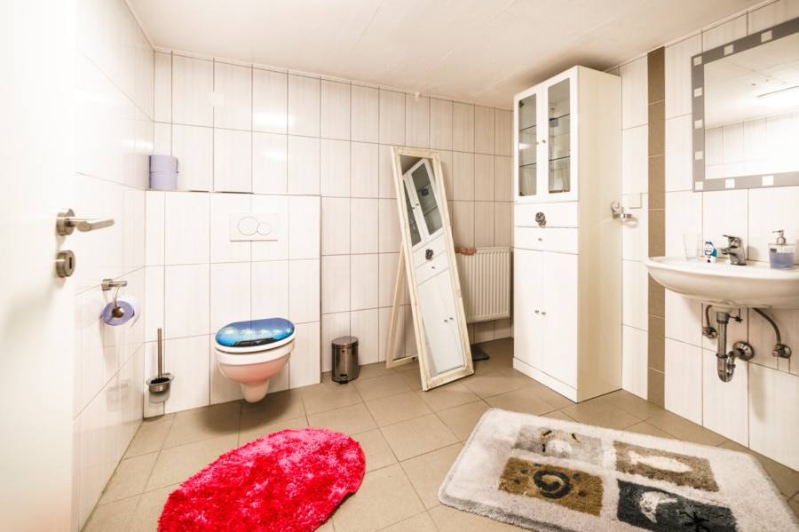 Badezimmer Keller - Nachhaltigkeit trifft Komfort – Ein moderner Bungalow mit Charakter in Mettingen!