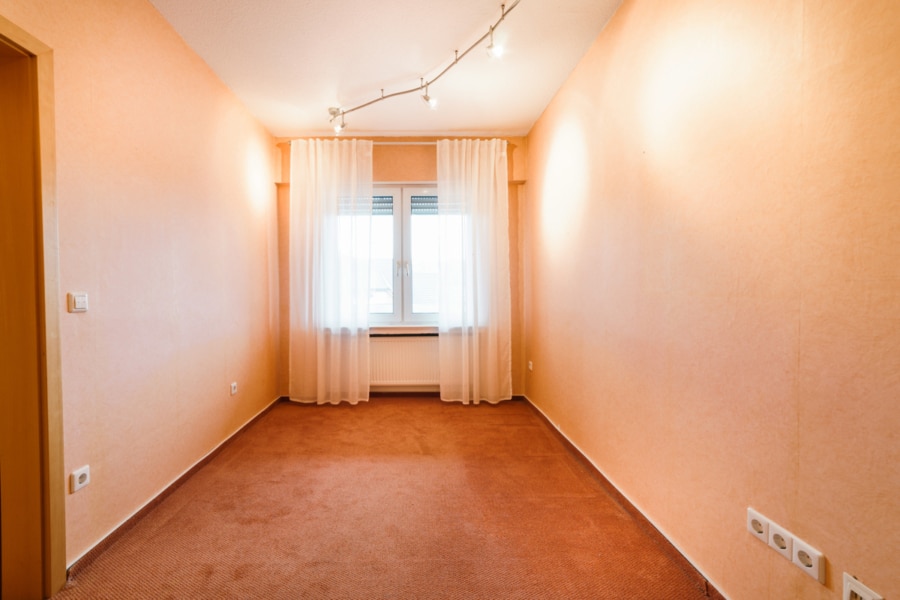 Schlafzimmer Wohnung OG - Wohnen und Arbeiten unter einem Dach – Ihr Immobilieninvestment in Ibbenbüren/Püsselbüren