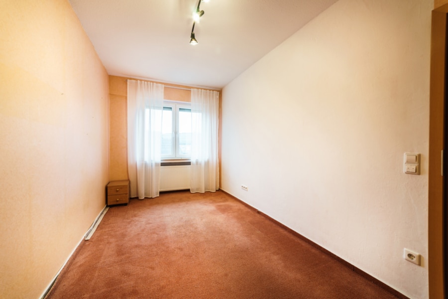 Schlafzimmer Wohnung OG - Wohnen und Arbeiten unter einem Dach – Ihr Immobilieninvestment in Ibbenbüren/Püsselbüren