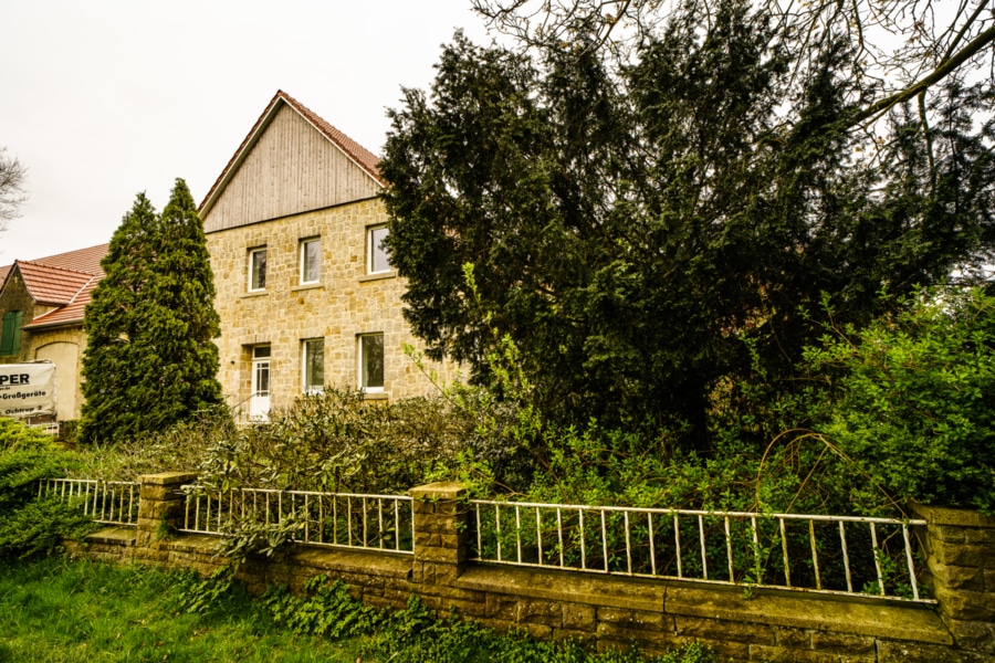 Außenansicht - Idyllisches Wohnen im Grünen: Kernsanierte DG-Wohnung mit ländlichem Ausblick und modernem Komfort!