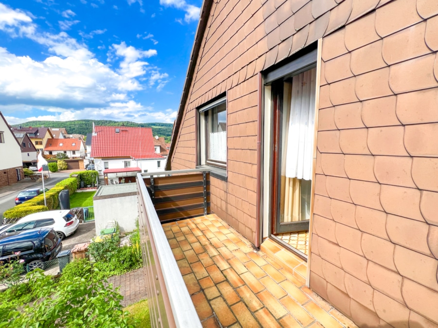 OG_1. Balkon - Freistehendes Einfamilienhaus mit Garage und Garten